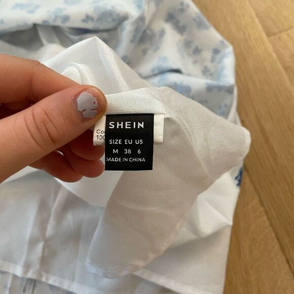 White off the shoulder dress with blue flowers - Picture 4 of 5